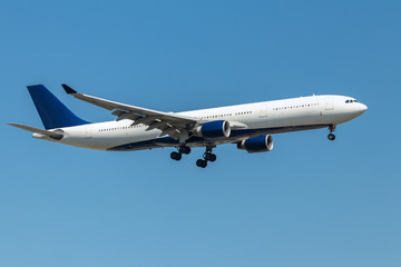 Generic passenger airplane in flight, captured before lading