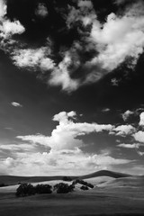 dramatic sky with clouds over hills in california