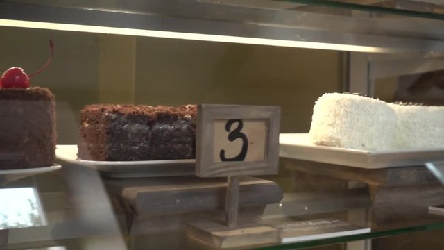 Cakes at coffee shop, slider move, titles of cakes in Russian