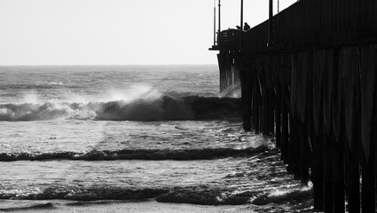 Crashing waves and a pier