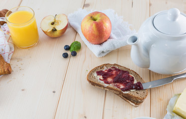 Breakfast on a wooden simple table.. Croissants Breakfast with aromatic tast. Good morning, great start to the day.