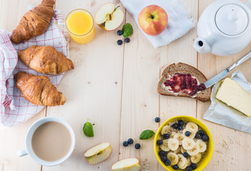 Breakfast on a wooden simple table.. Croissants Breakfast with aromatic tast. Good morning, great start to the day.