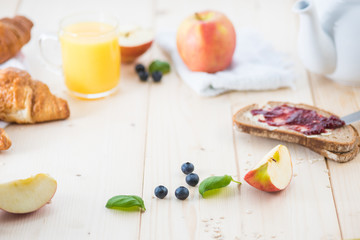 Breakfast on a wooden simple table.. Croissants Breakfast with aromatic tast. Good morning, great start to the day.
