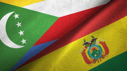 Fototapeta premium Comoros and Bolivia two flags textile cloth, fabric texture 