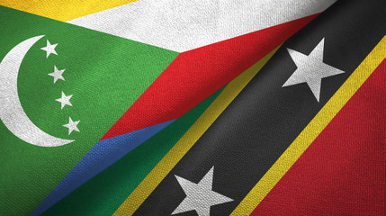 Comoros and Saint Kitts and Nevis two flags textile cloth, fabric texture