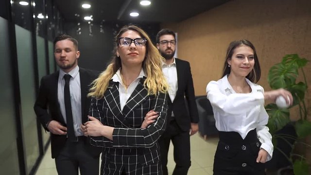 Businessmen Walking Down the Hall