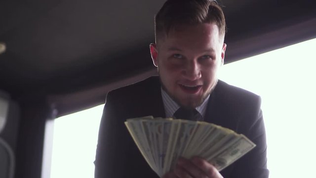 Businessman Throws Money