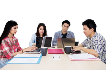 Group of young freelancer working in the studio