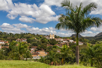 Fototapeta na wymiar Tiradentes, Minas Gerais, Brazil - March 28, 2019: View of the city of Tiradentes from the Holy Trinity Sanctuary, a small church with a privileged view.