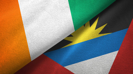Cote d'Ivoire and Antigua and Barbuda two flags textile cloth, fabric texture 