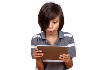 Little boy using digital tablet.