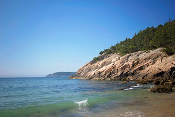 Sand Beach, Acadia National Park, Bar Harbor Maine A gorgeous beach surrounded by interesting rocks, cliffs and forest. 