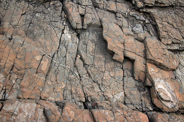 Large Rocks with Striations and Grooves on the Shore Path Bar Harbor Maine Unique rocks with interesting and intricate textures. Beautiful path along the Atlantic ocean featuring all types of rocks.
