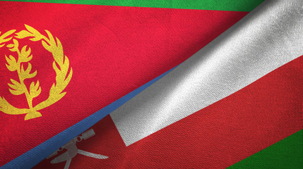 Fototapeta premium Eritrea and Oman two flags textile cloth, fabric texture