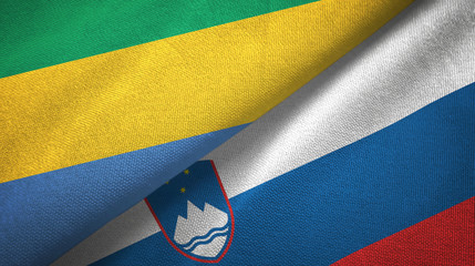 Gabon and Slovenia two flags textile cloth, fabric texture