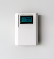 Carbon dioxide level. Digital CO2 meter equipment isolated on white