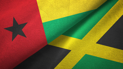 Guinea-Bissau and Jamaica two flags textile cloth, fabric texture