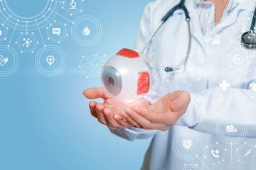 The doctor supports the human eye .