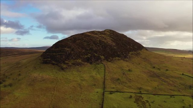 Mt Slemsh, a volcanic plug located in Co. Antrim outside Ballymena in N. Ireland, aerial view.