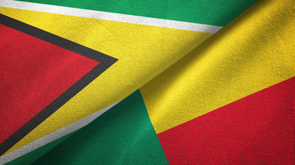 Guyana and Benin two flags textile cloth, fabric texture 