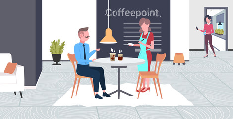 waitress taking order from businessman visitor cafe worker in apron serving drinks to man having break business time concept modern coffee point interior flat full length horizontal