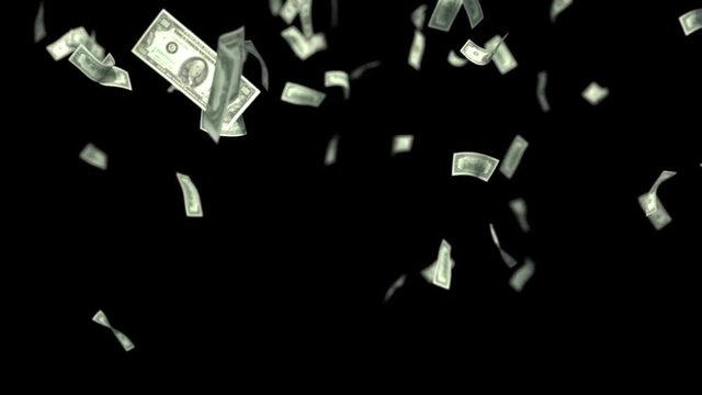 High quality shot of falling dollar bills with depth of field.