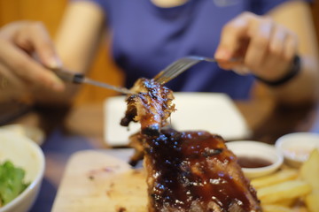 hand with pork streak meal food