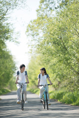 Obraz premium 自転車に乗るカップル