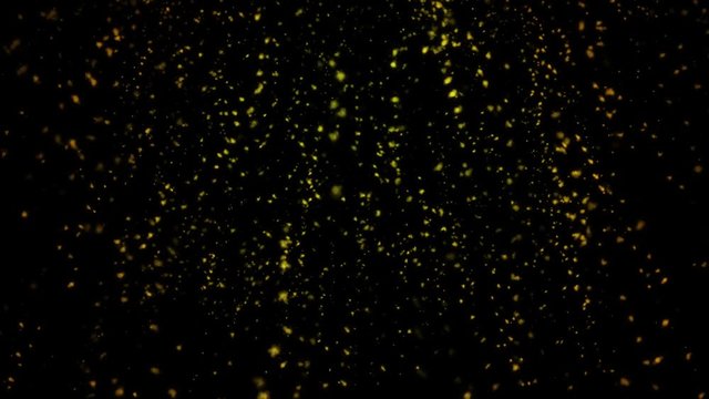 motion of yellow cloudlets fall slowly with black background
