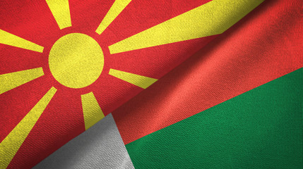 North Macedonia and Madagascar two flags textile cloth, fabric texture