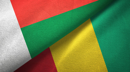 Madagascar and Guinea two flags textile cloth, fabric texture