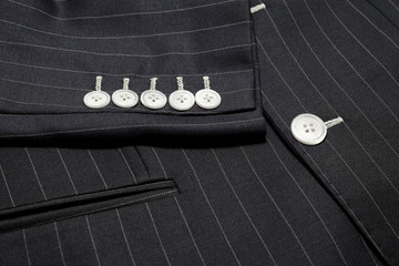 Bespoke jacket ,top view..Close up detail of custom made two button jacket with pinstripe pattern...