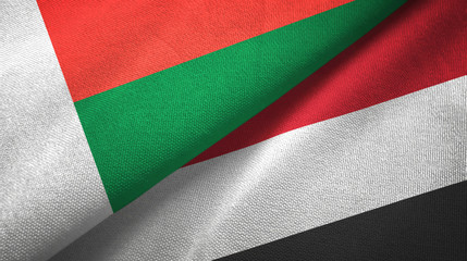 Madagascar and Yemen two flags textile cloth, fabric texture