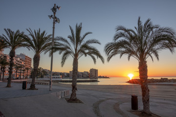 Obraz na płótnie Canvas Beach street of Torrevieja Spain during sunrise