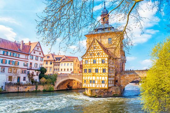 Historical Town Hall on Bamberg Obere bridge or brucke across the river Regnitz, Bamberg, Germany.