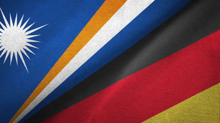 Marshall Islands and Germany two flags textile cloth, fabric texture