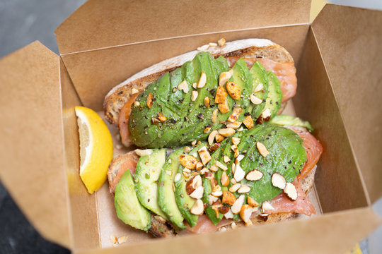 Healthy Breakfast Lifestyle, Avocado and Salmon Delicious Toasts.
