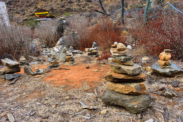 Stones piled up in prayer offerings in Paro, Bhutan.