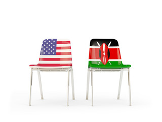 Two chairs with flags of United States and kenya isolated on white