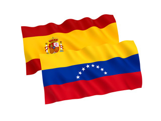 National fabric flags of Venezuela and Spain isolated on white background. 3d rendering illustration. 1 to 2 proportion.