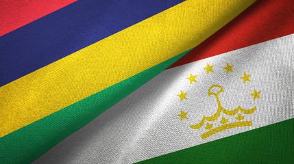 Fototapeta premium Mauritius and Tajikistan two flags textile cloth, fabric texture