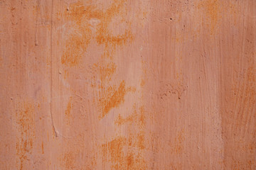 Grunge metal wall background of red brown painted garage. Copy space