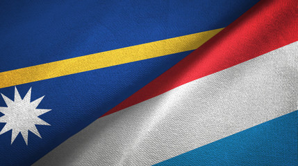 Nauru and Luxembourg two flags textile cloth, fabric texture