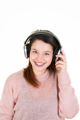 smiling brunette young happy woman with headphones listen to music