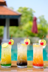 summer drinks and cocktails at swimming pool