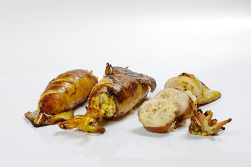 Charcoal grilled stuffed Squid Calamari cattle fish on white background
