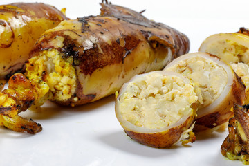 Charcoal grilled stuffed Squid Calamari cattle fish on white background