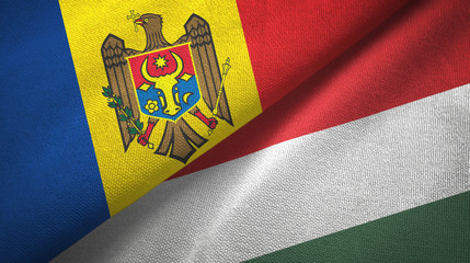 Moldova and Hungary two flags textile cloth, fabric texture