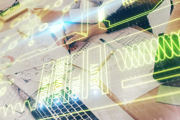 Education theme hologram over woman's hands writing background. Concept of study. Double exposure