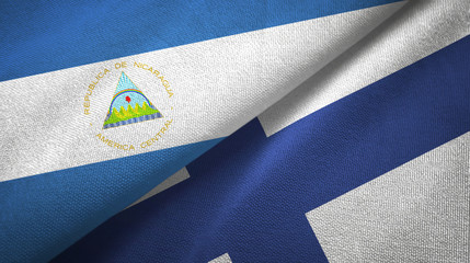 Nicaragua and Finland two flags textile cloth, fabric texture